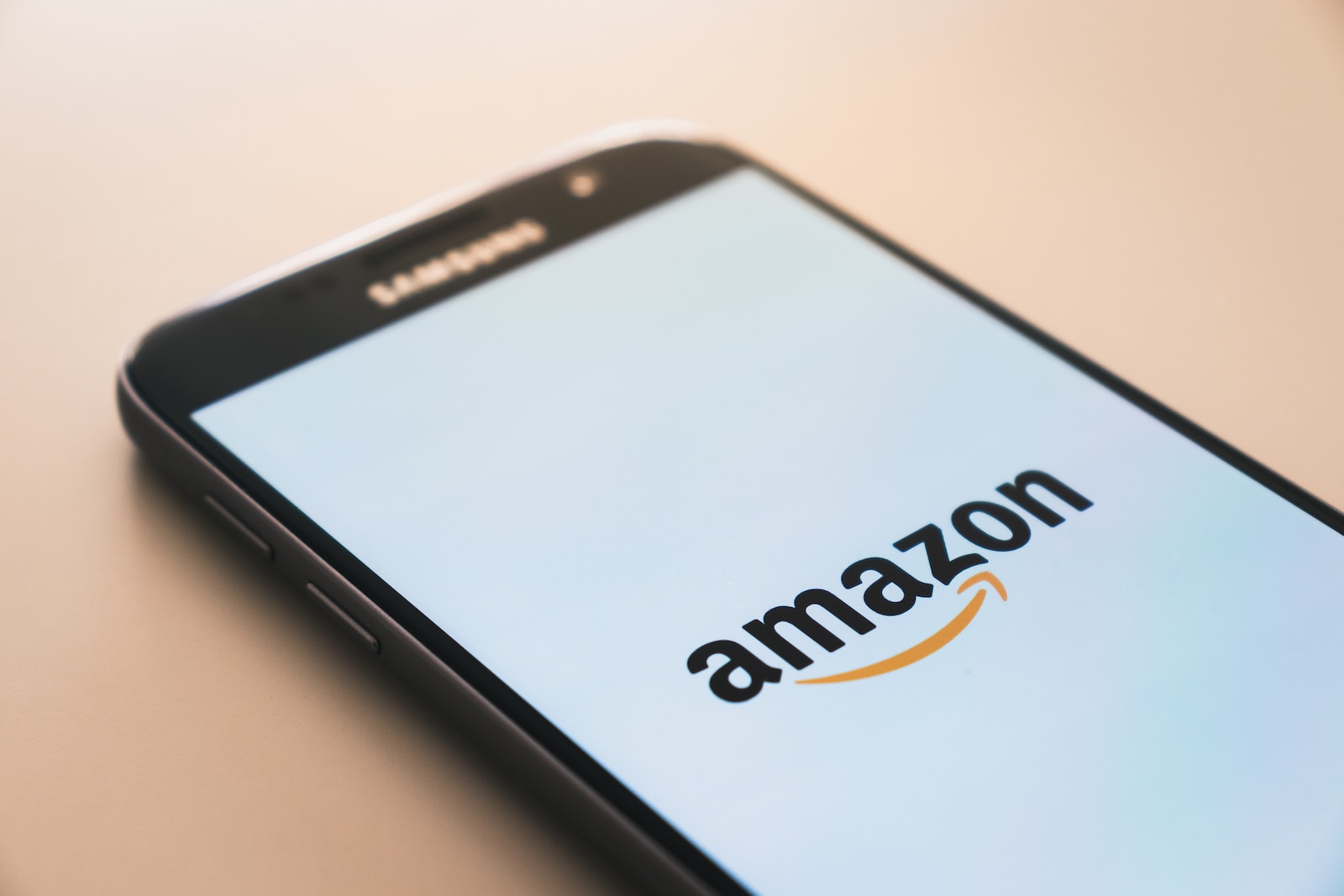 where to get cheap pet Supplies black Samsung Galaxy smartphone displaying Amazon logo
