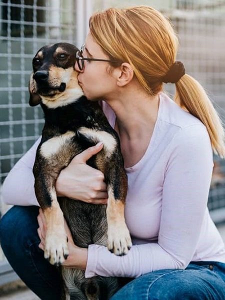 girl adopt a dog